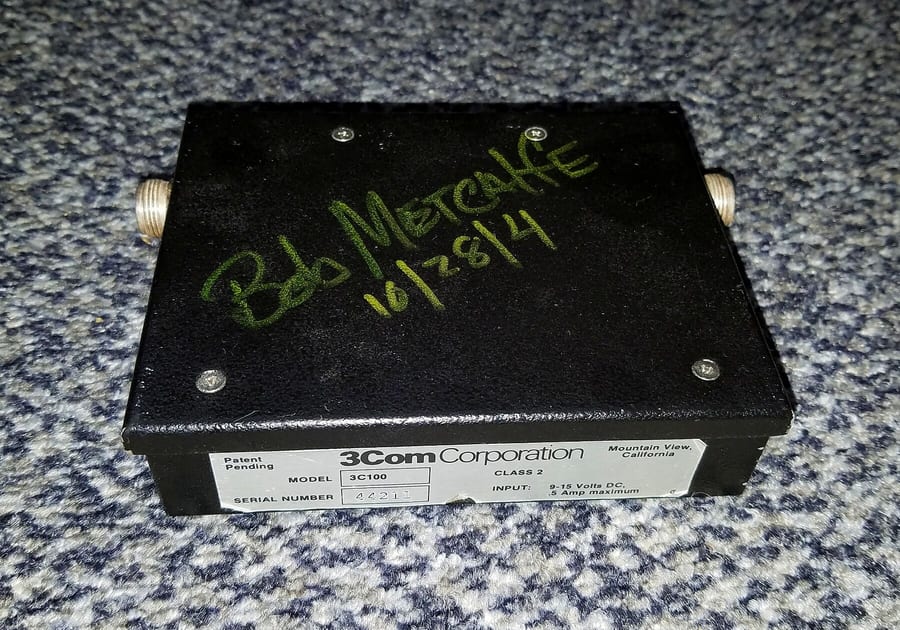 Photograph of an early Ethernet cable connector.