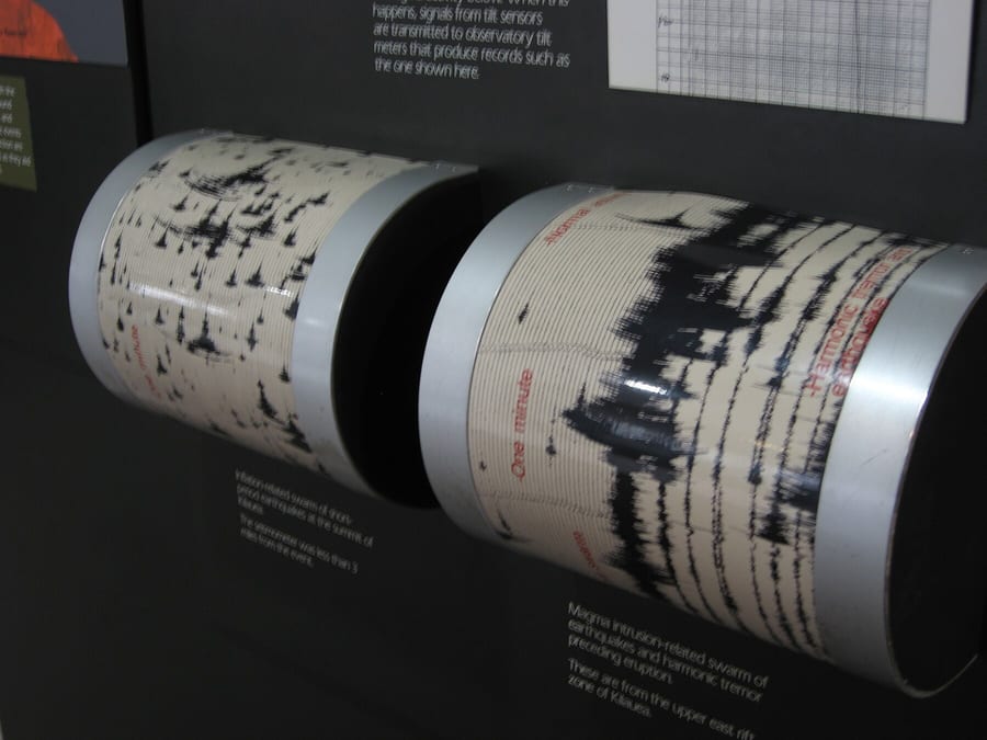 Photograph of multiple seismograph instruments.