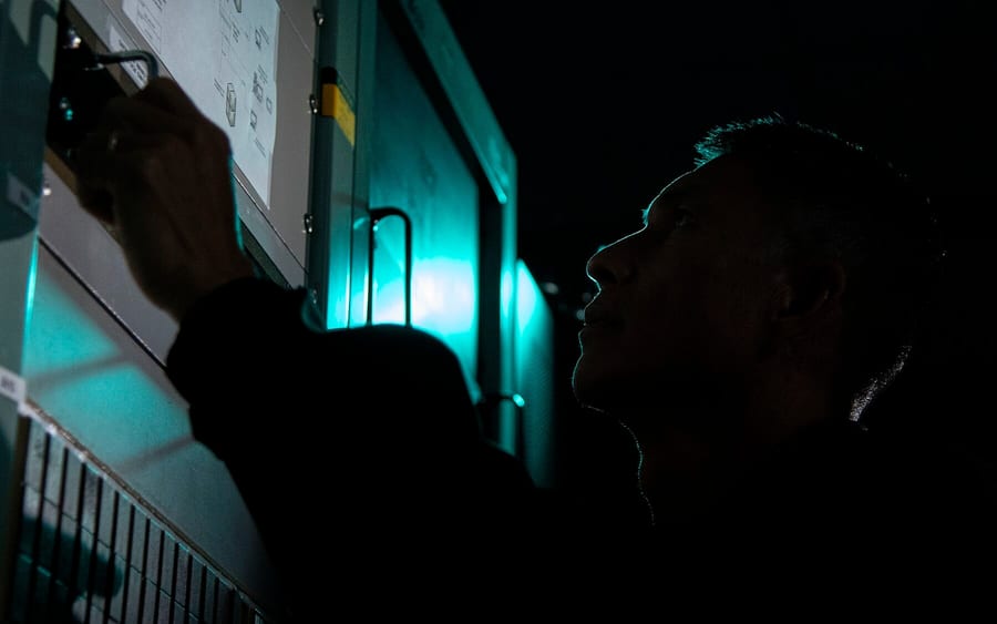 Photograph of a ground-antenna operator.