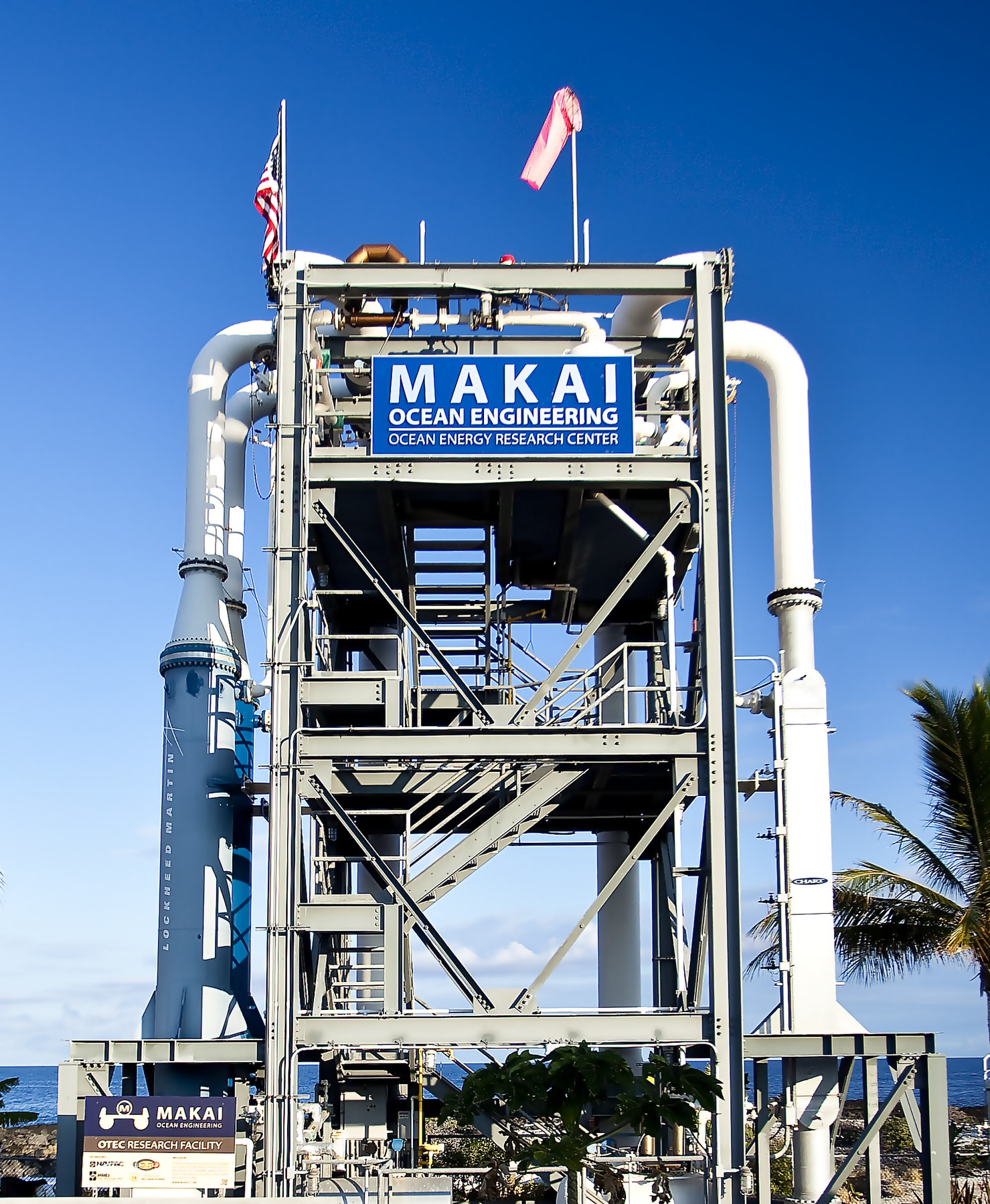 Vertical view of pipes and machinery at a Kona OTEC plant.