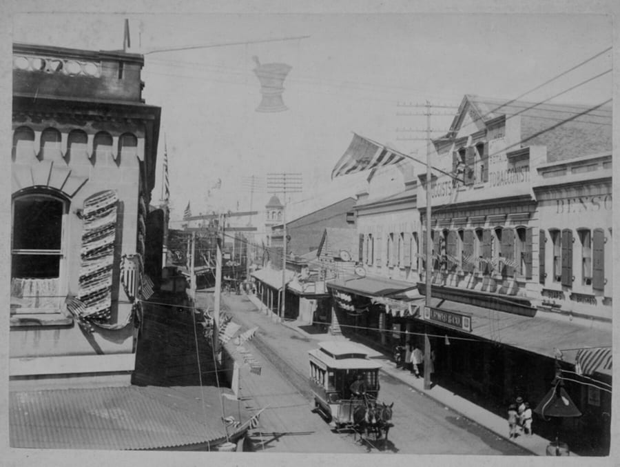 Historic photograph of downtown Honolulu businesses, 1894.